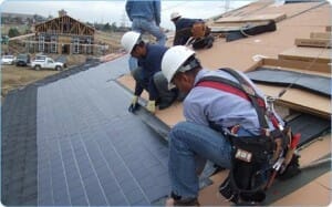 Roof experts on roof Colorado Springs